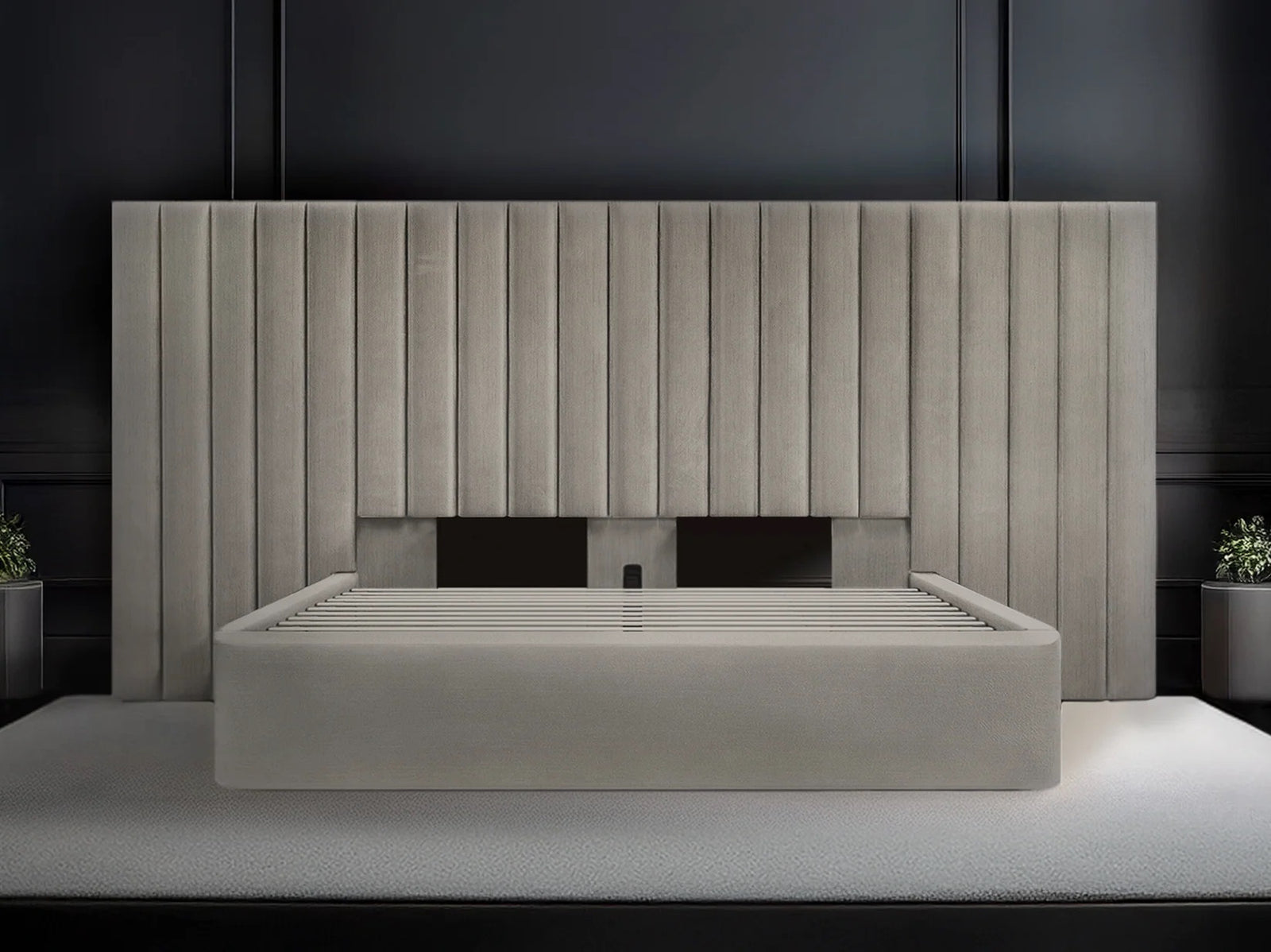 Modern bed with a large headboard in a dark room