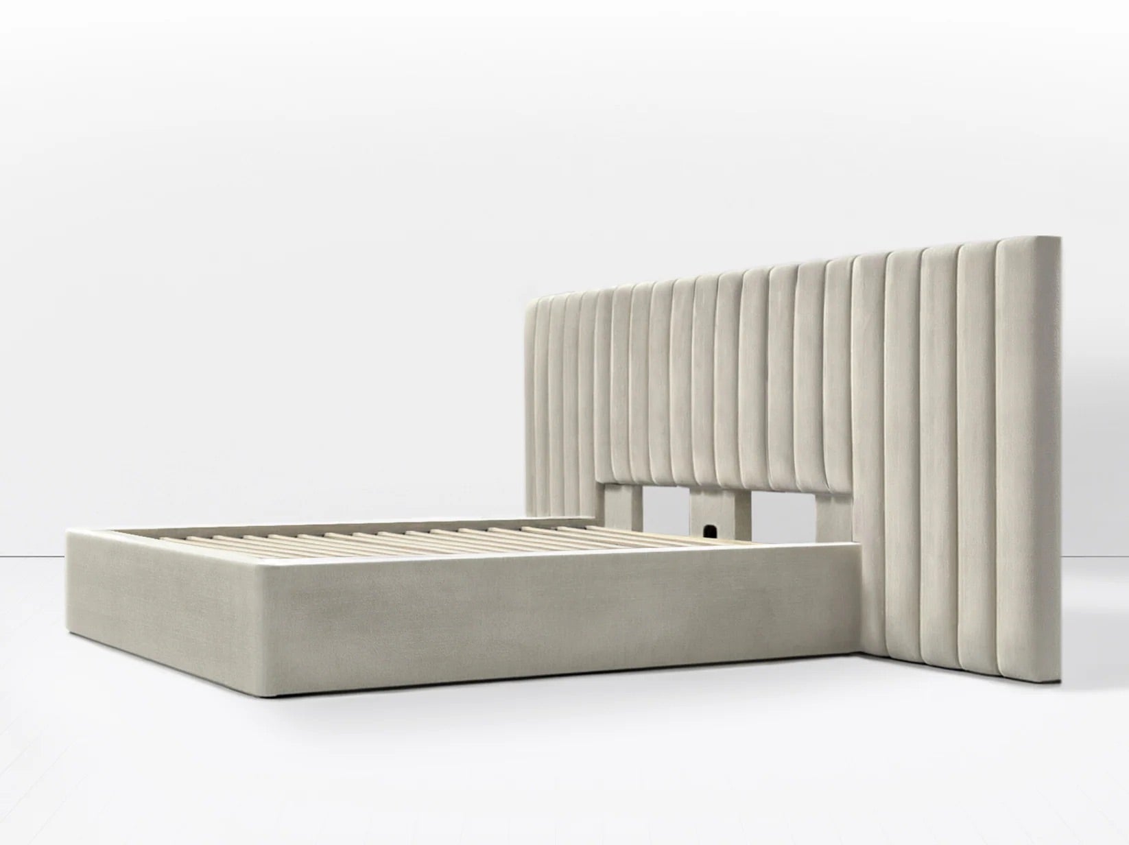 Beige upholstered bed with a matching headboard on a white background