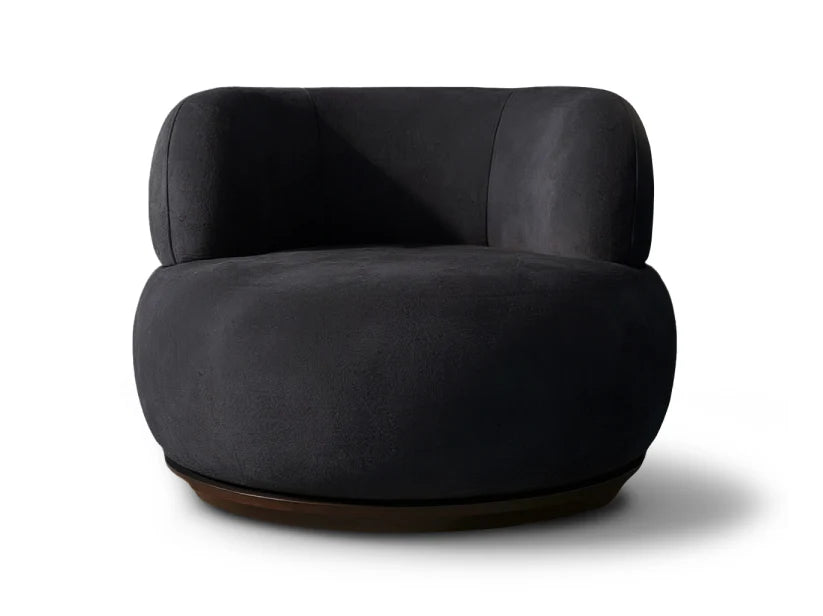 Dark gray armchair on a white background