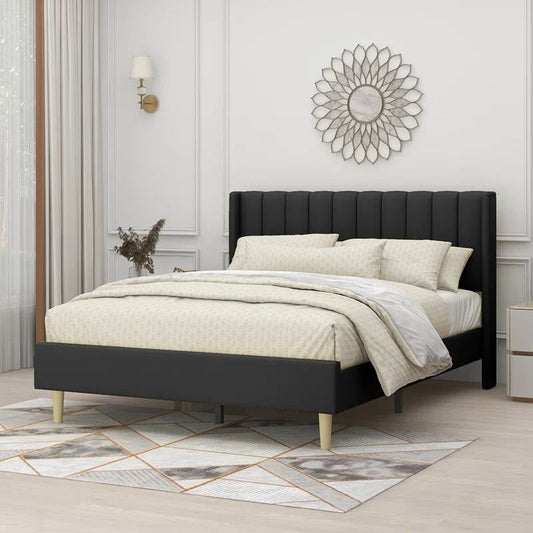 queen size black platform bed in bedroom