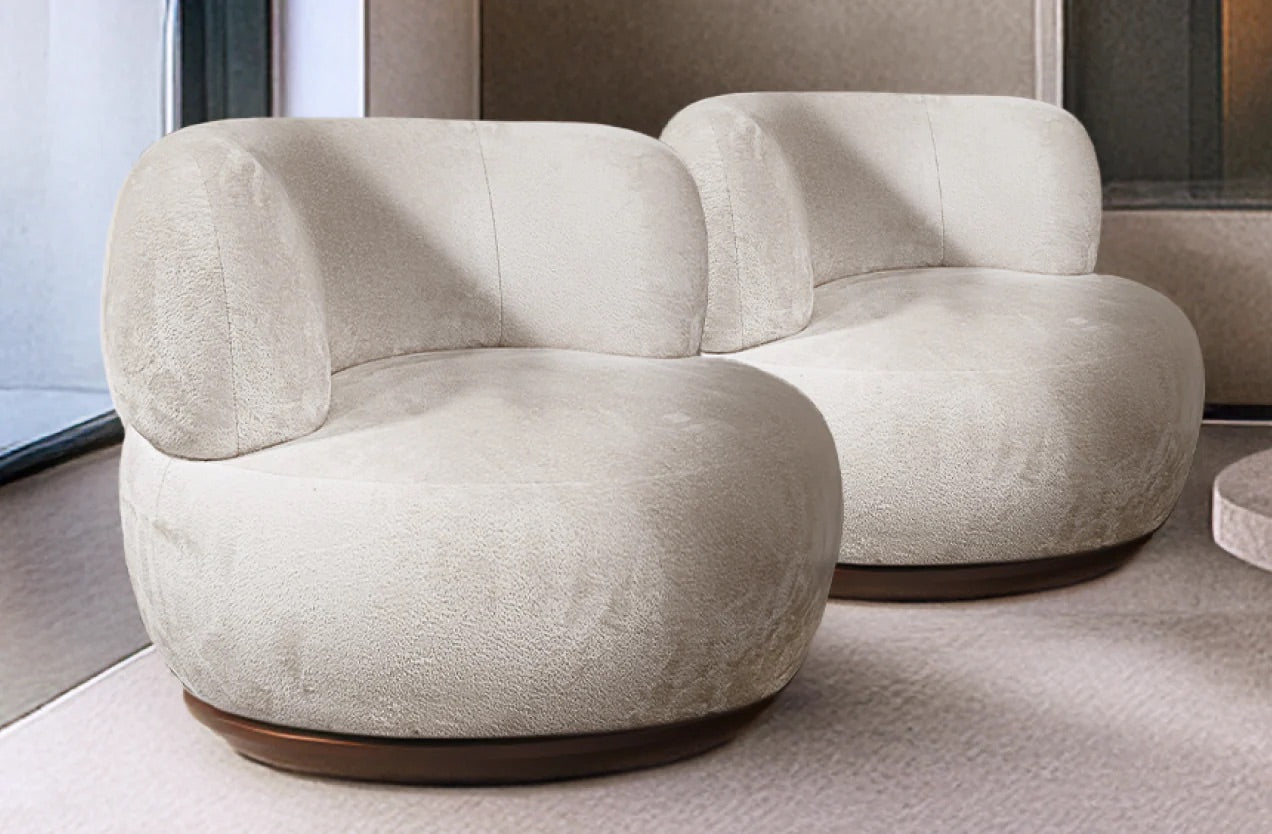 Modern beige sofa with a textured surface in a minimalistic setting
