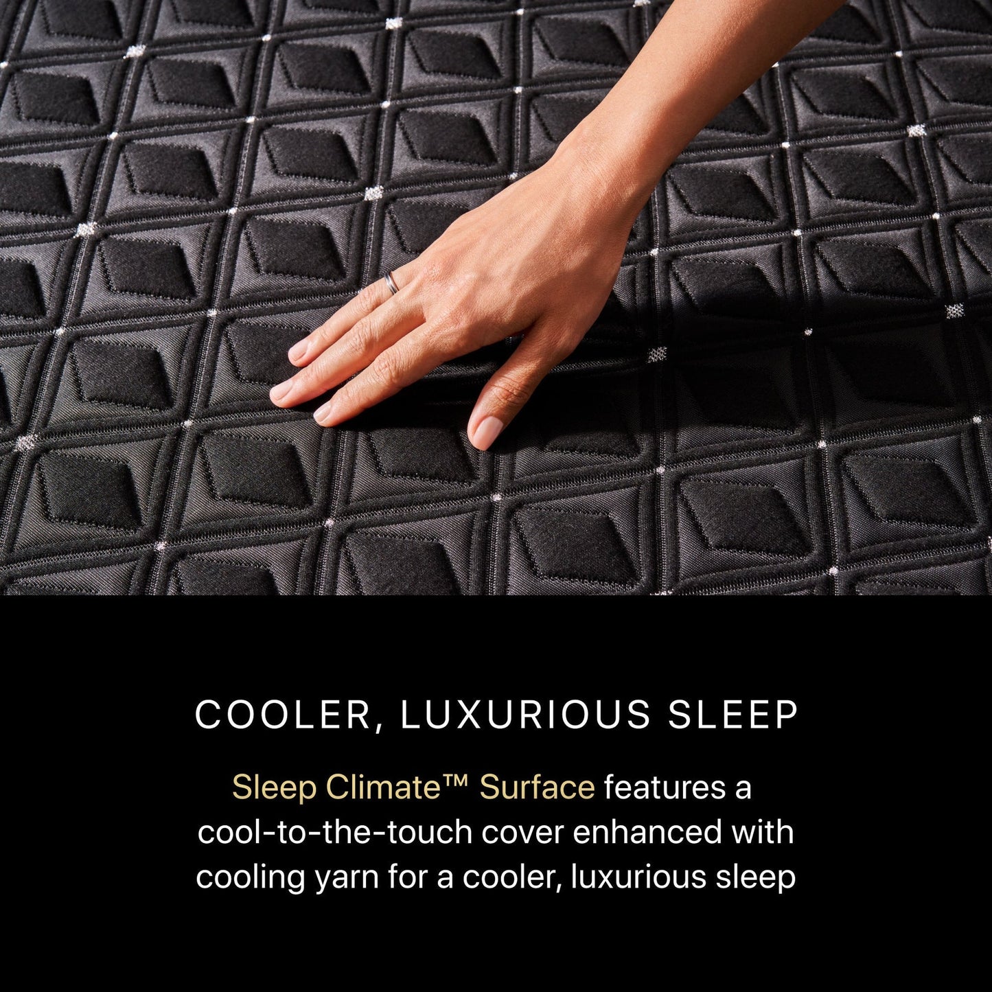 Hand touching a beautyrest black mattress firm surface with text about Sleep Climate® Surface