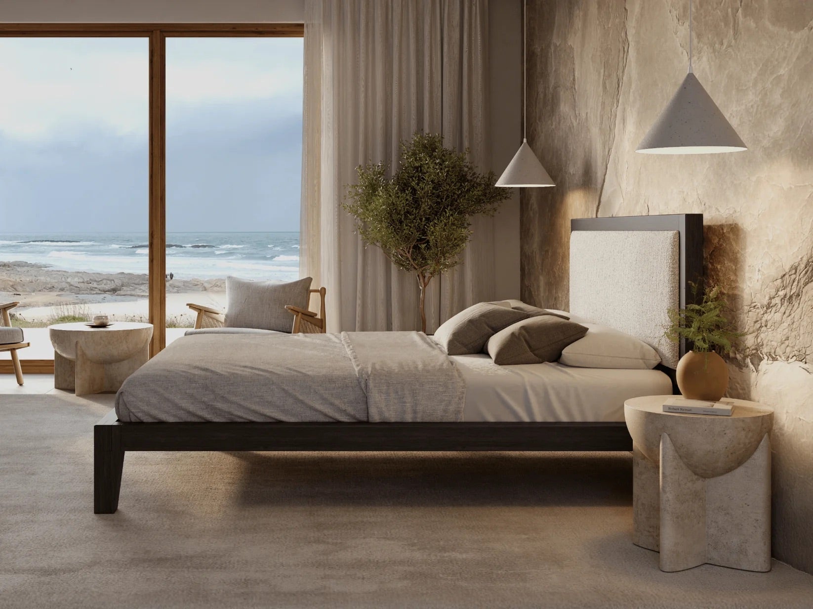 Modern bedroom with ocean view, bed, and decor