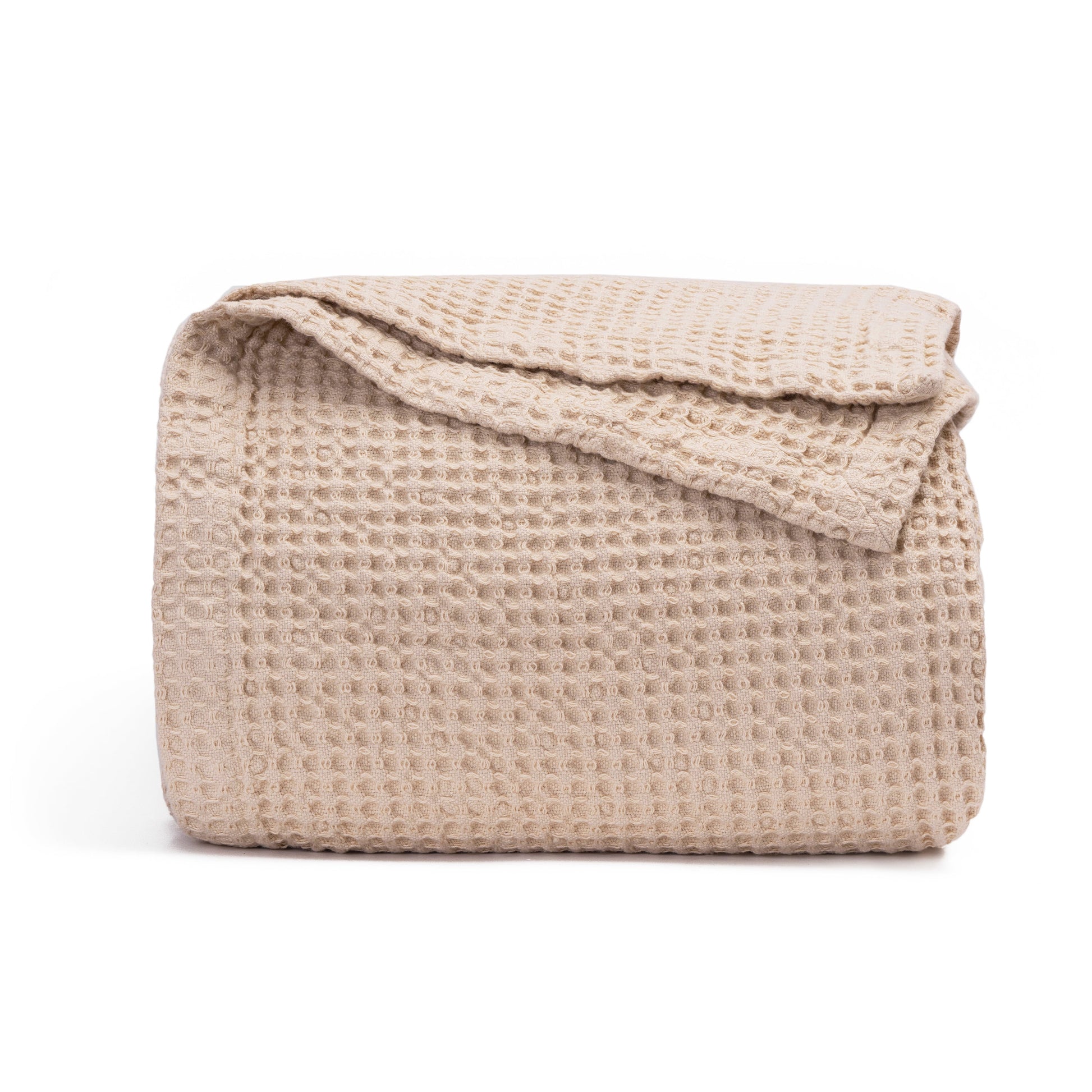 Beige textured blanket on a white background