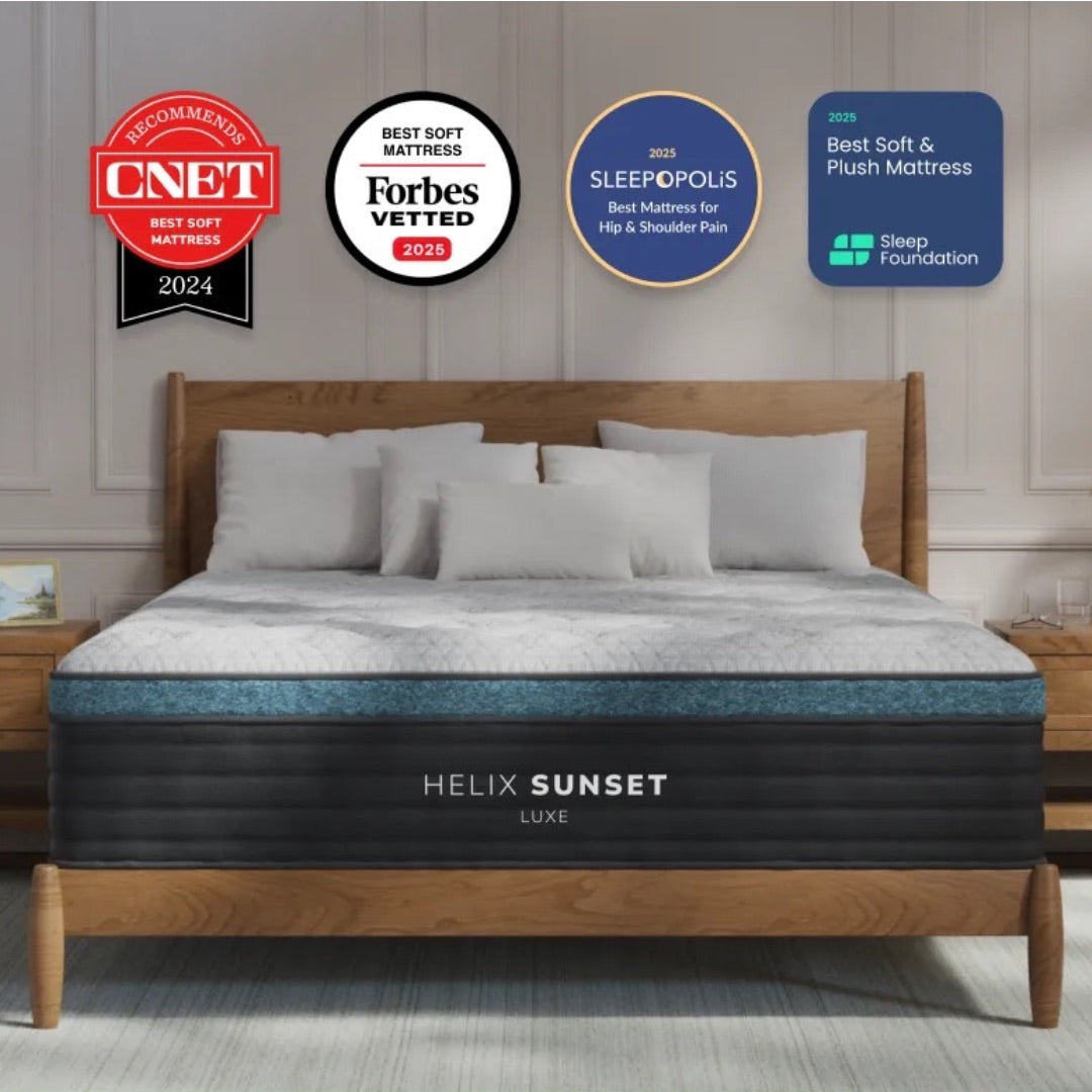 Helix Sunset Luxe mattress with various awards on a wooden bed frame.