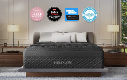 Helix Elite mattress in a bedroom setting with various awards displayed above it.