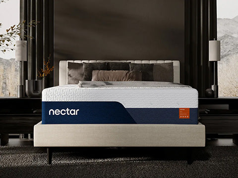 Nectar mattress in a bedroom setting with large windows.