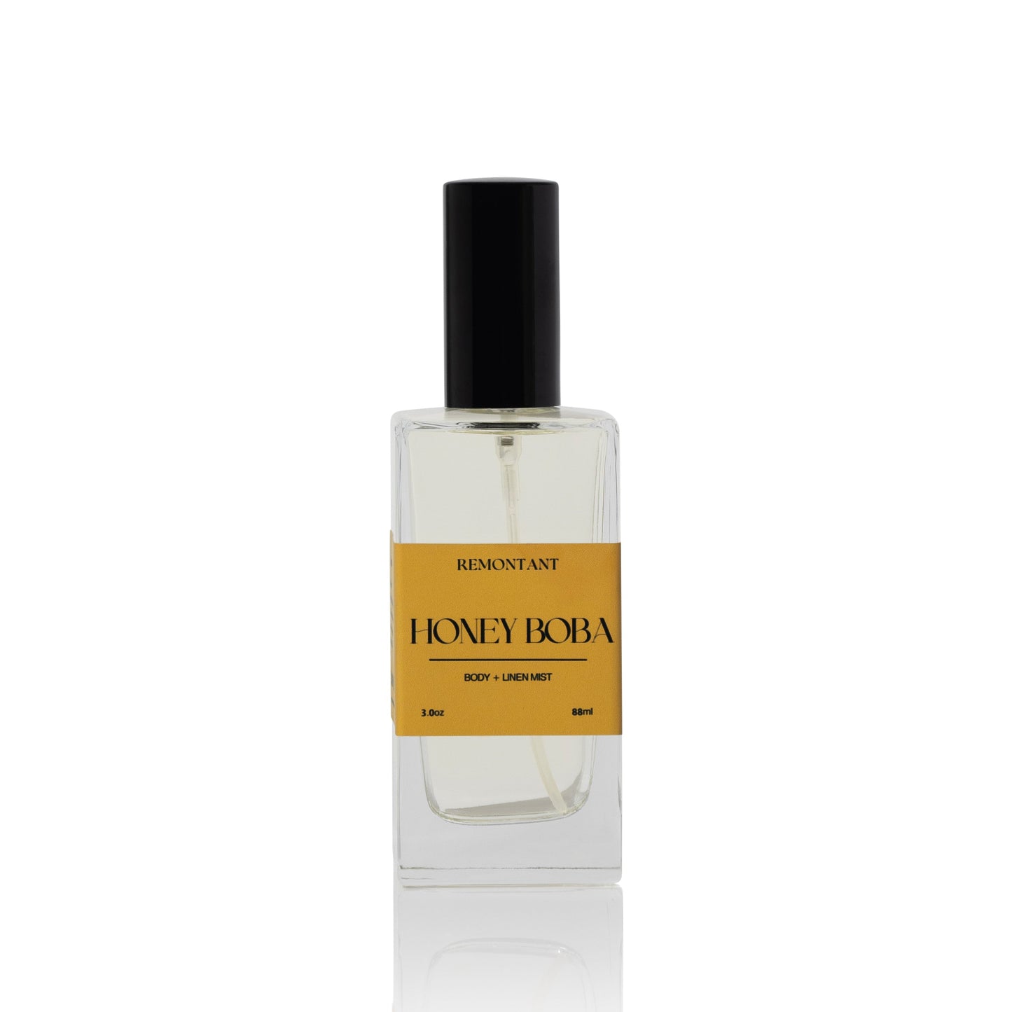Body and Linen mist glass bottle labeled 'Honey Boba' by Remontant on a white background