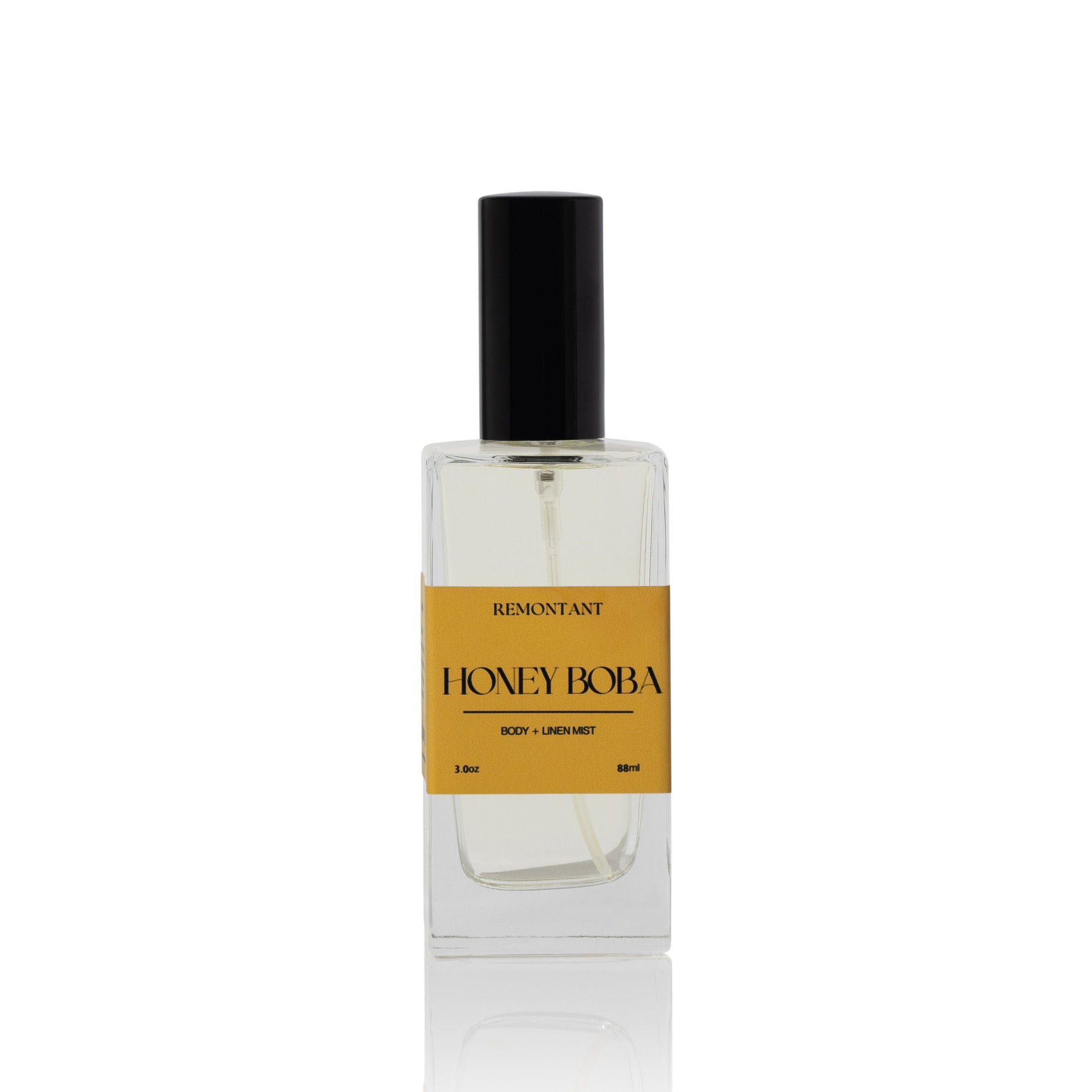 Body and Linen mist glass bottle labeled 'Honey Boba' by Remontant on a white background