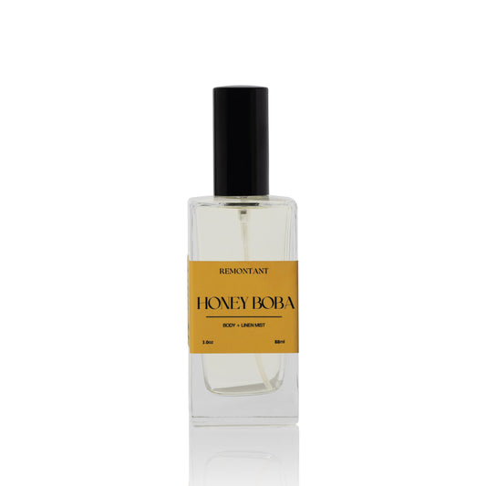 Body and Linen mist glass bottle labeled 'Honey Boba' by Remontant on a white background