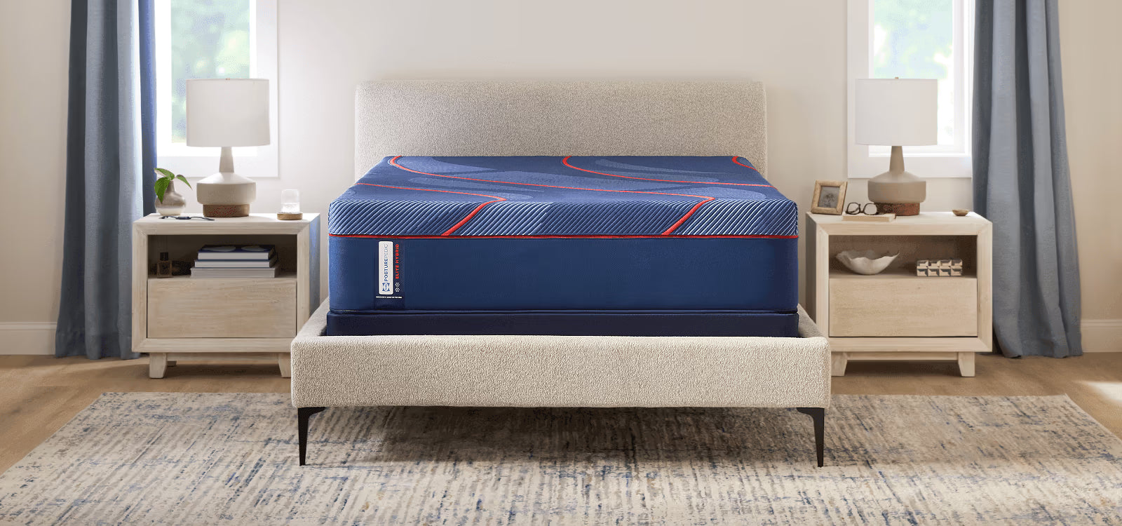 Blue mattress on a bed in a bedroom setting