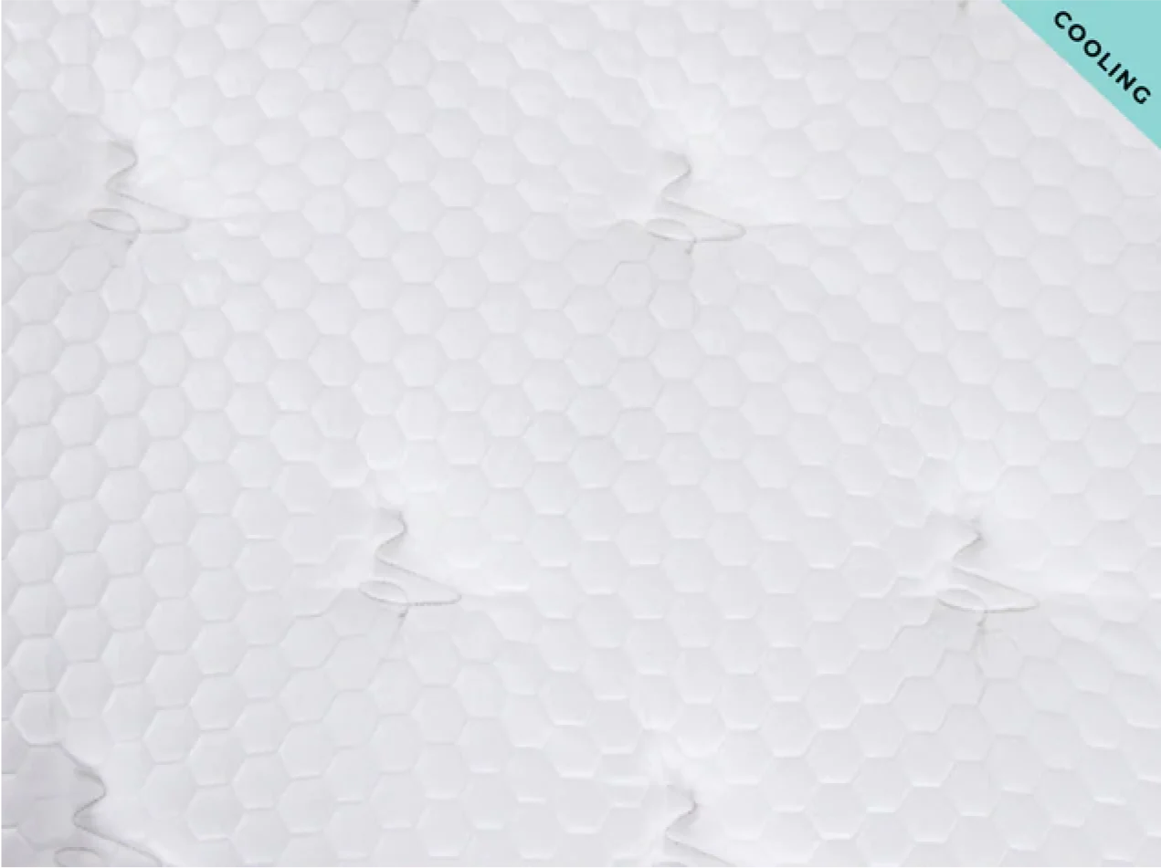 Textured white mattress cover with 'Cooling' label on a light blue background