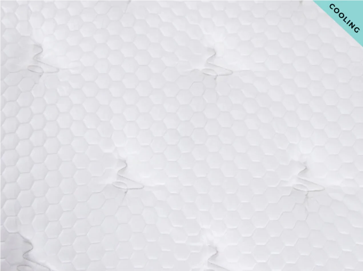 Textured white mattress cover with 'Cooling' label on a light blue background