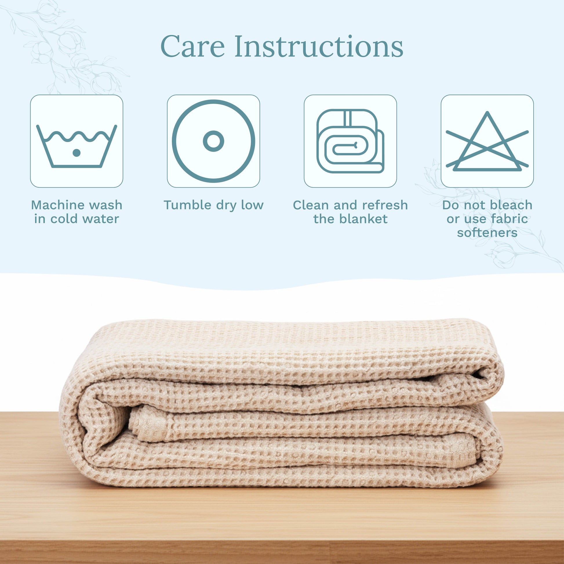 Folded beige blanket on a wooden surface with care instructions displayed above.