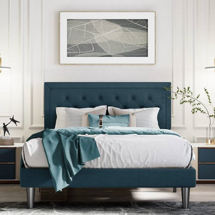 King size blue upholstered tufted bed frame in modern styled bedroom