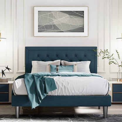 King size blue upholstered tufted bed frame in modern styled bedroom
