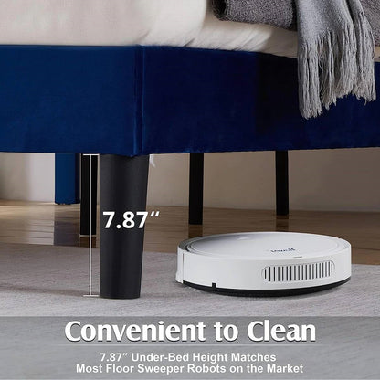 Robotic floor sweeper under a bed with text indicating height compatibility.
