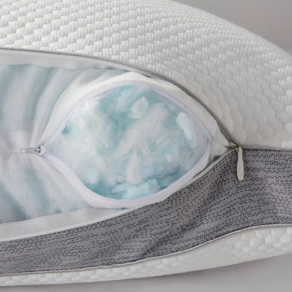 Close-up of a pillow with a zipper open, revealing a blue removable interior.