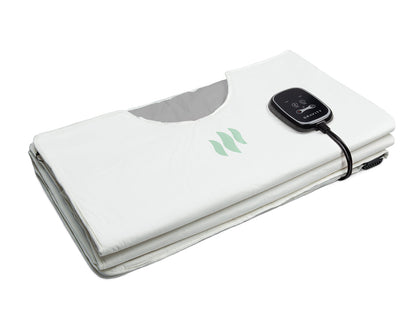 Compactly folded white cream infrared sauna blanket