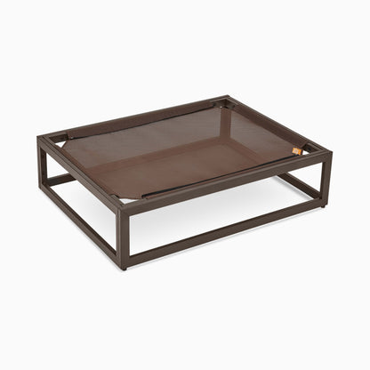 Brown pet bed with metal frame on a white background