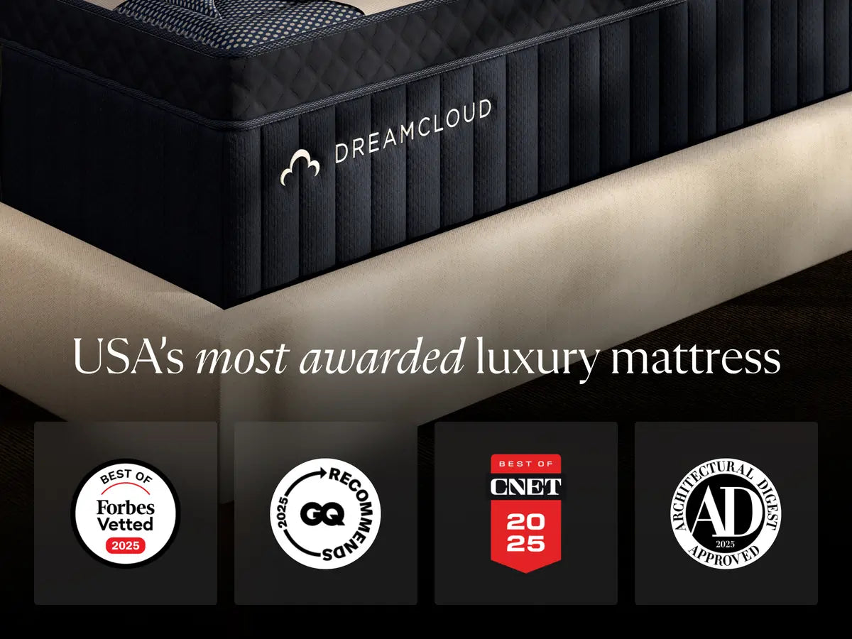 DreamCloud mattress with awards displayed on a dark background
