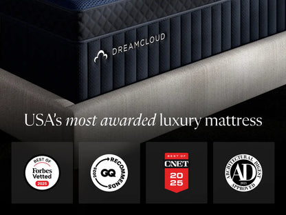 DreamCloud mattress with certification badges on a black background