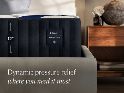 Memory foam mattress with text highlighting dynamic pressure relief in a bedroom setting.