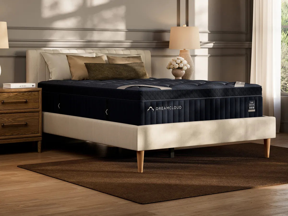 DreamCloud mattress on a bed in a bedroom setting