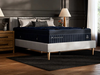 DreamCloud mattress on a bed in a bedroom setting