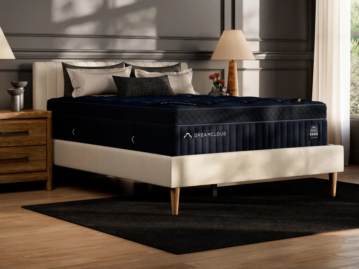 DreamCloud mattress on a bed in a bedroom setting