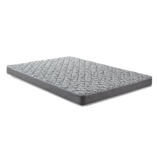 Gray mattress on a white background