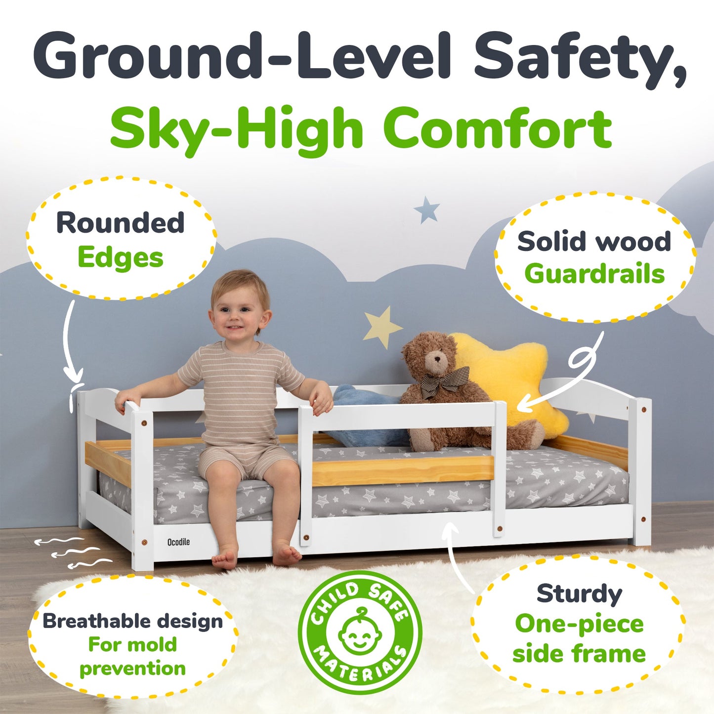 Child sitting on a bed with safety features highlighted, including rounded edges and solid wood guardrails.