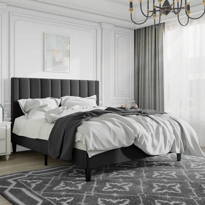 Black velvet full size upholstered platform bed frame in modern luxury bedroom.