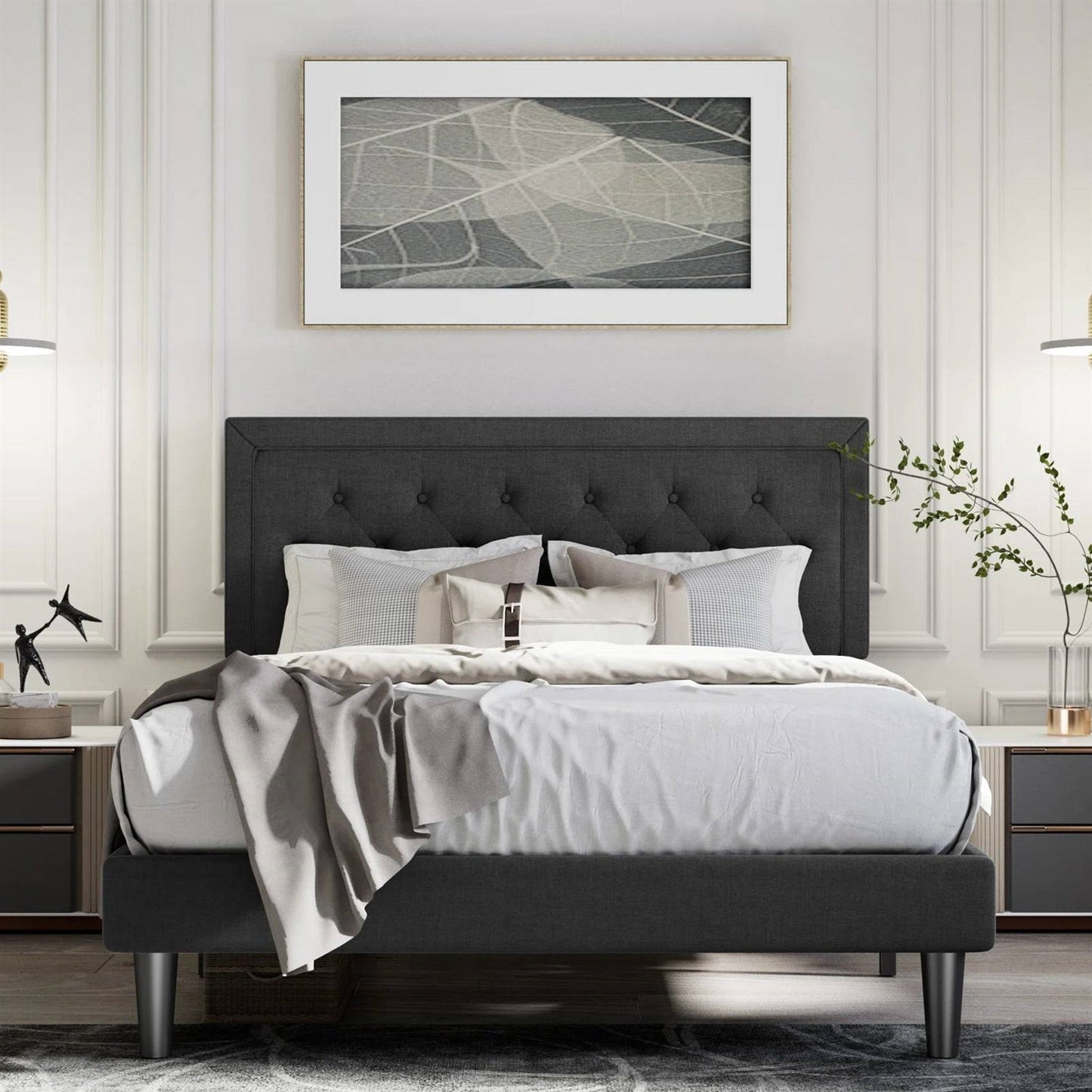 Full size black linen upholstered platform bed frame in a stylish bedroom with decorative elements.