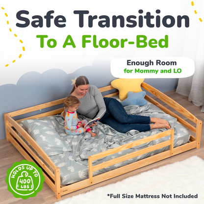 Woman and child on a wooden floor-bed with safety rail, text 'Safe Transition To A Floor-Bed' and 'Enough Room for Mommy and LO'.
