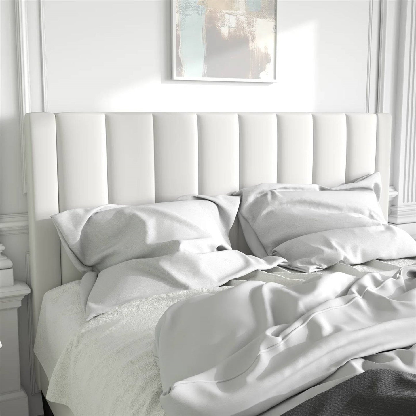 White velvet bed frame with striped headboard in a bright bedroom