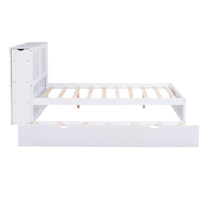 White trundle bed frame with wooden slats on a white background