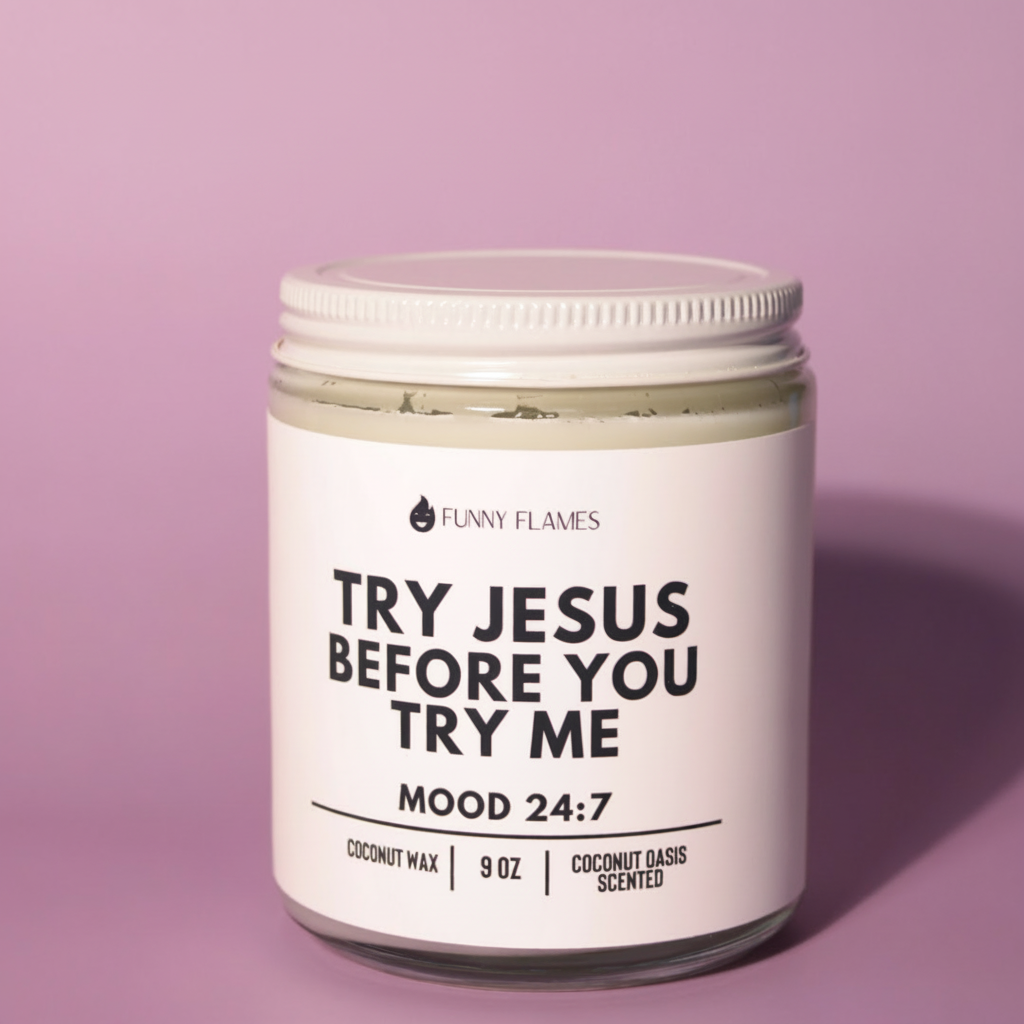 Jar of coconut oasis scented candle with humorous label on a pink background