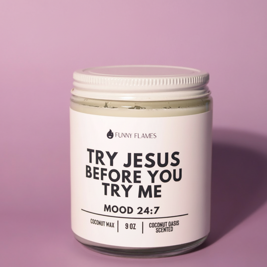 Jar of coconut oasis scented candle with humorous label on a pink background