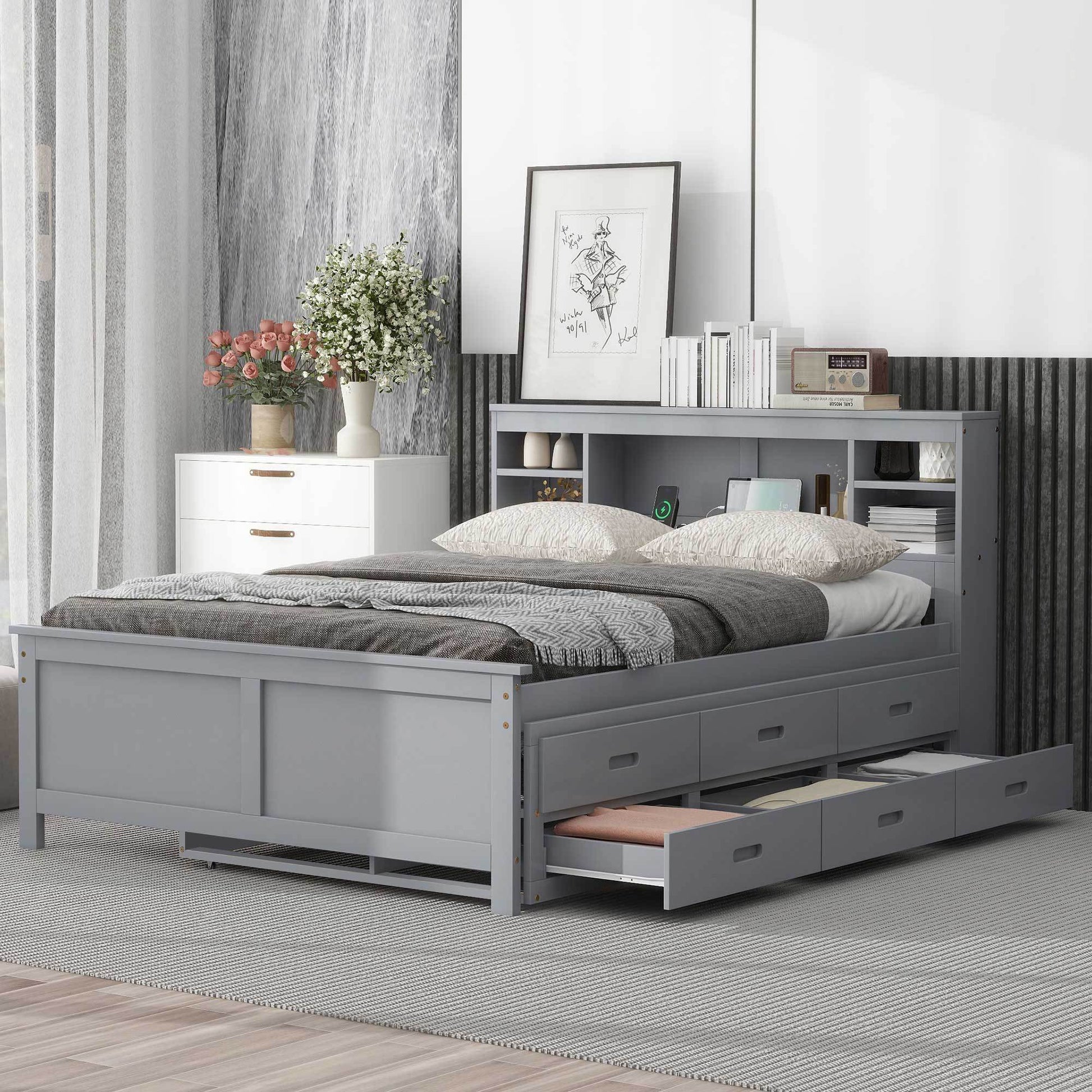 Full size gray platform bed with storage drawers in a bedroom setting