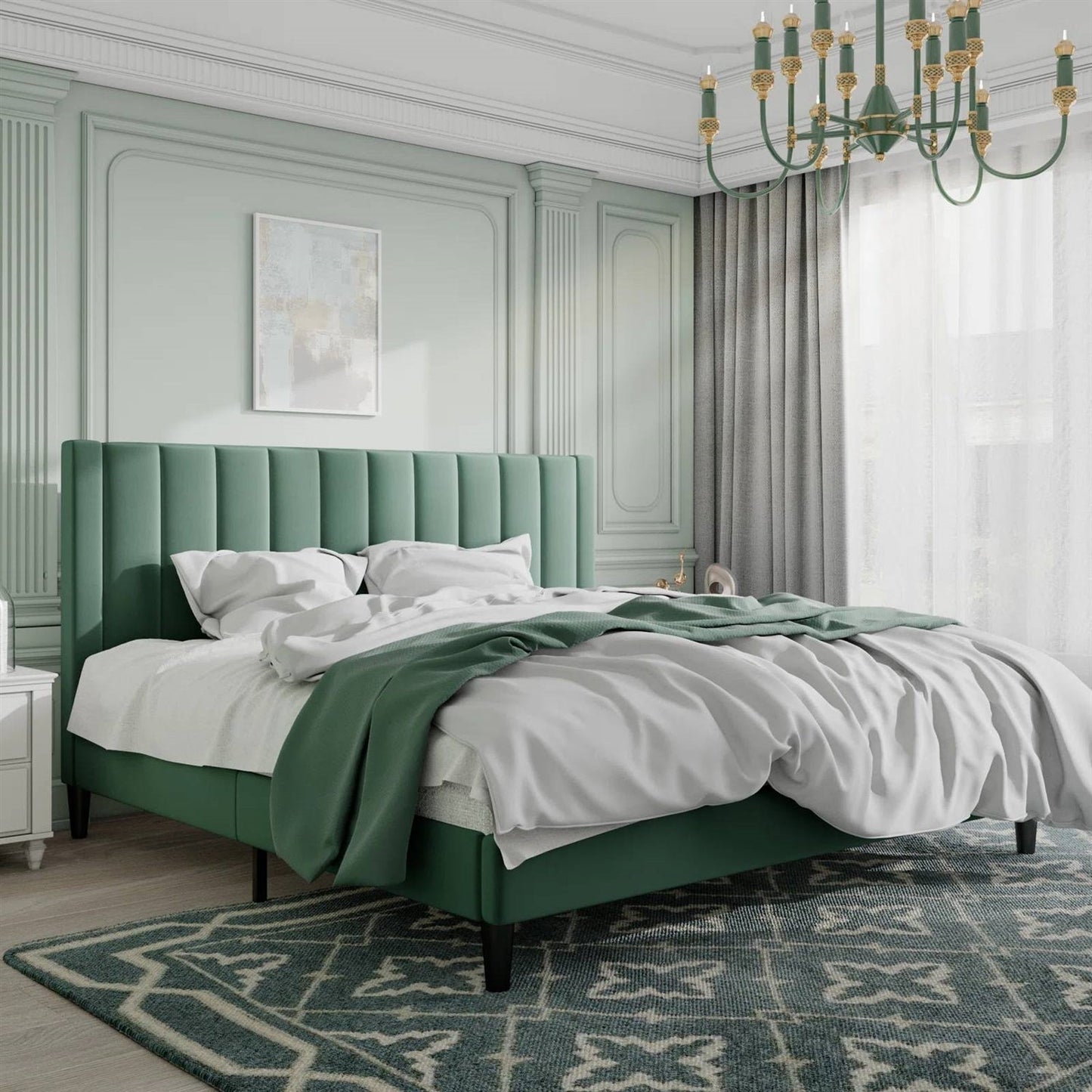King size green velvet upholstered platform bed in a stylish bedroom with a chandelier and artwork.