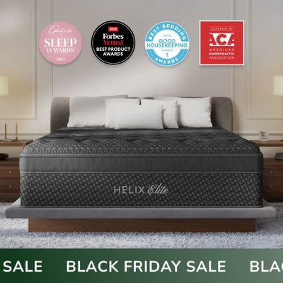 Helix Elite mattress with various awards displayed in a bedroom setting