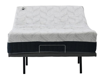 Mattress with a quilted cover on an adjustable bed frame base on white background