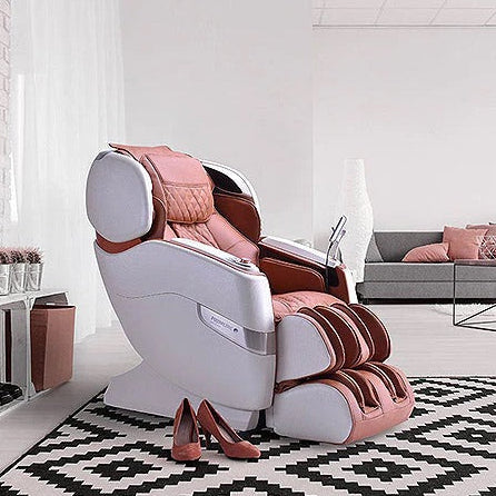 Massage chair in a modern living room setting with a white wall and black and white patterned rug.