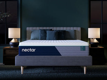 Nectar mattress on a bed in a darkly decorated room with two lamps.