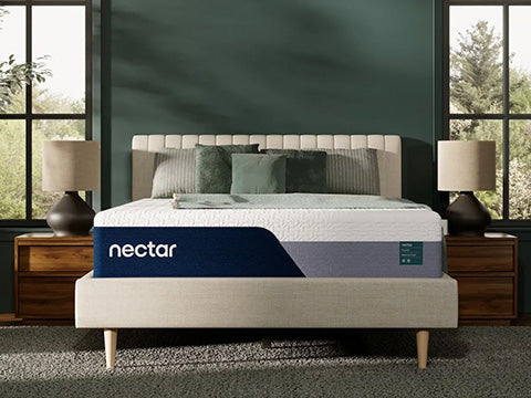 Nectar mattress on a bed in a room with large windows and green walls