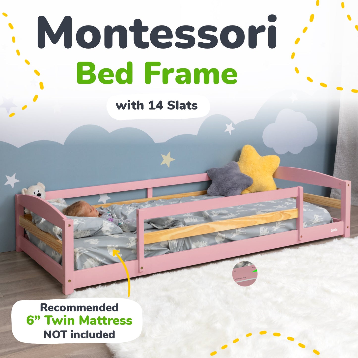 Pink Montessori bed frame with 14 slats and bedding, against a blue wall with cloud and star decorations.