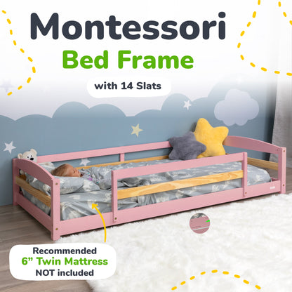 Pink Montessori bed frame with 14 slats and bedding, against a blue wall with cloud and star decorations.