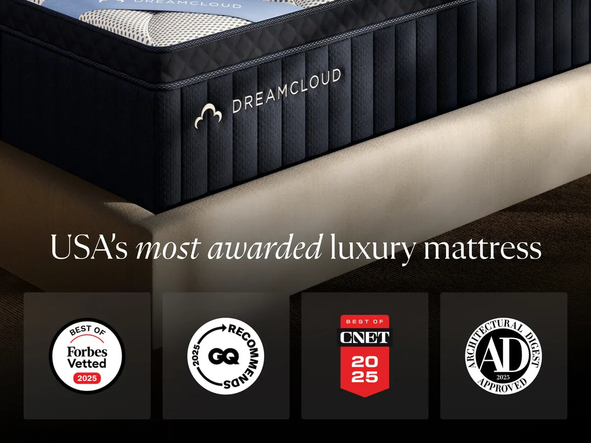 DreamCloud mattress with awards displayed on a dark background
