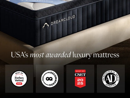DreamCloud mattress with awards displayed on a dark background